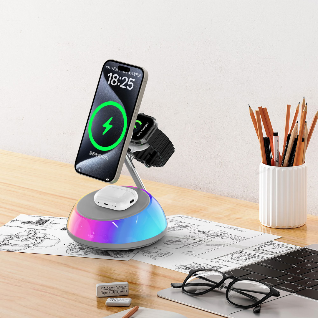 WiWU Aurora Wi-W036 Qi2.0 3-in-1 magnetic wireless charger station charging an iPhone, Apple Watch, and AirPods simultaneously on a tidy work desk, featuring fast 22.5W output, sleek zinc alloy design, and customizable LED atmosphere lighting for efficient and clutter-free workspace charging.
