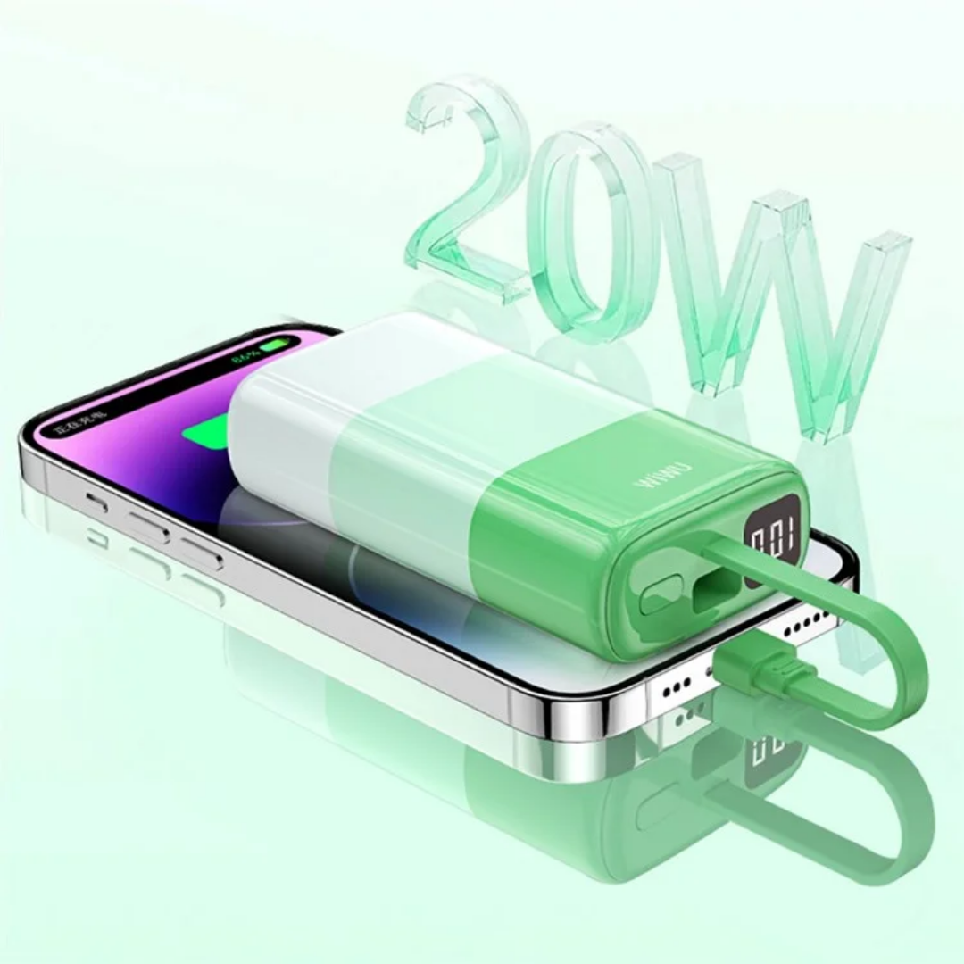 Pastel green WiWU power bank in horizontal position charging an iPhone using built-in cable, showing LED display at 100% battery and 20W fast charging capability.