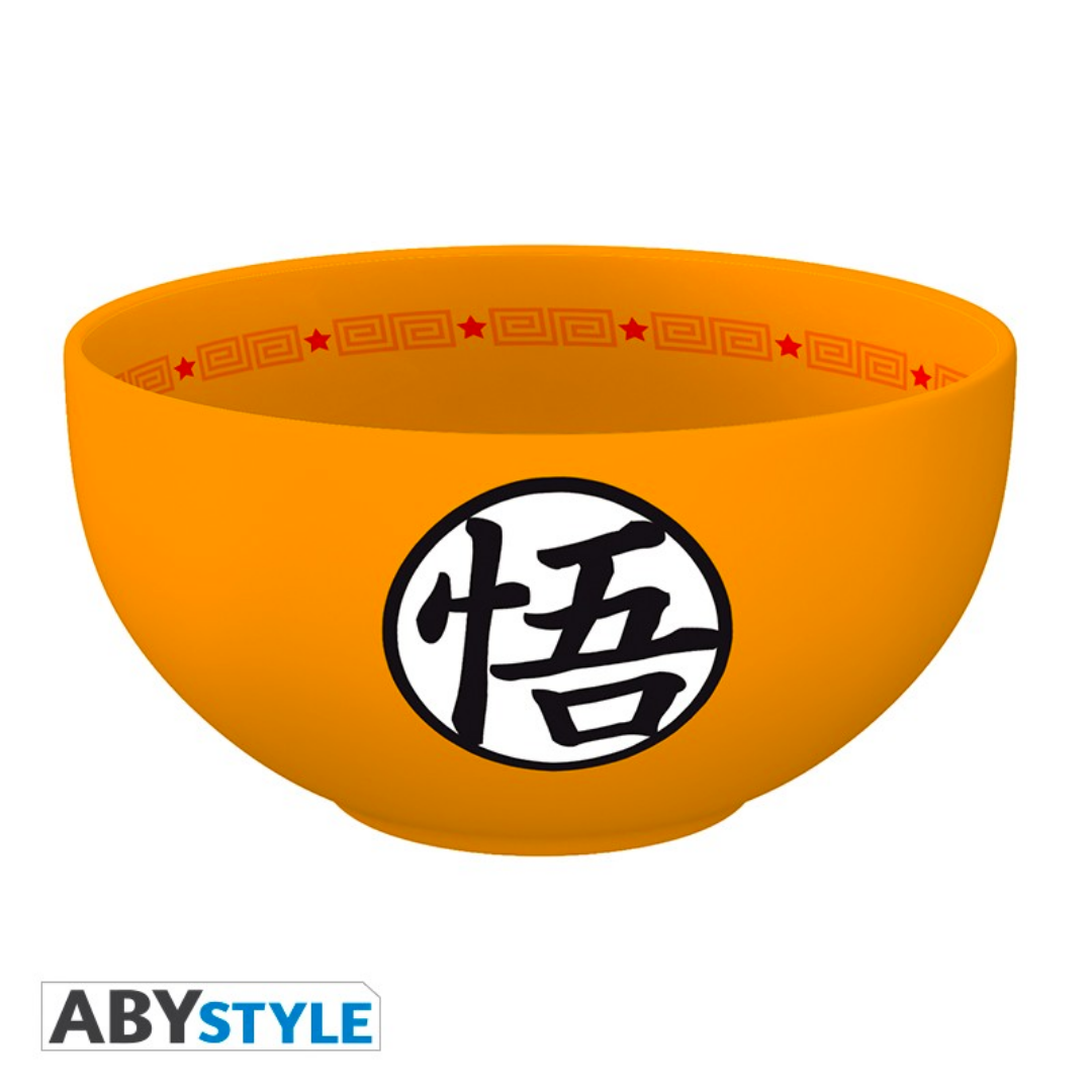 Reverse side of ABYstyle Dragon Ball Z orange stoneware bowl featuring Goku’s kanji symbol in black on a white circle, with red star and geometric pattern on the inner rim, 600ml capacity, official anime merchandise.