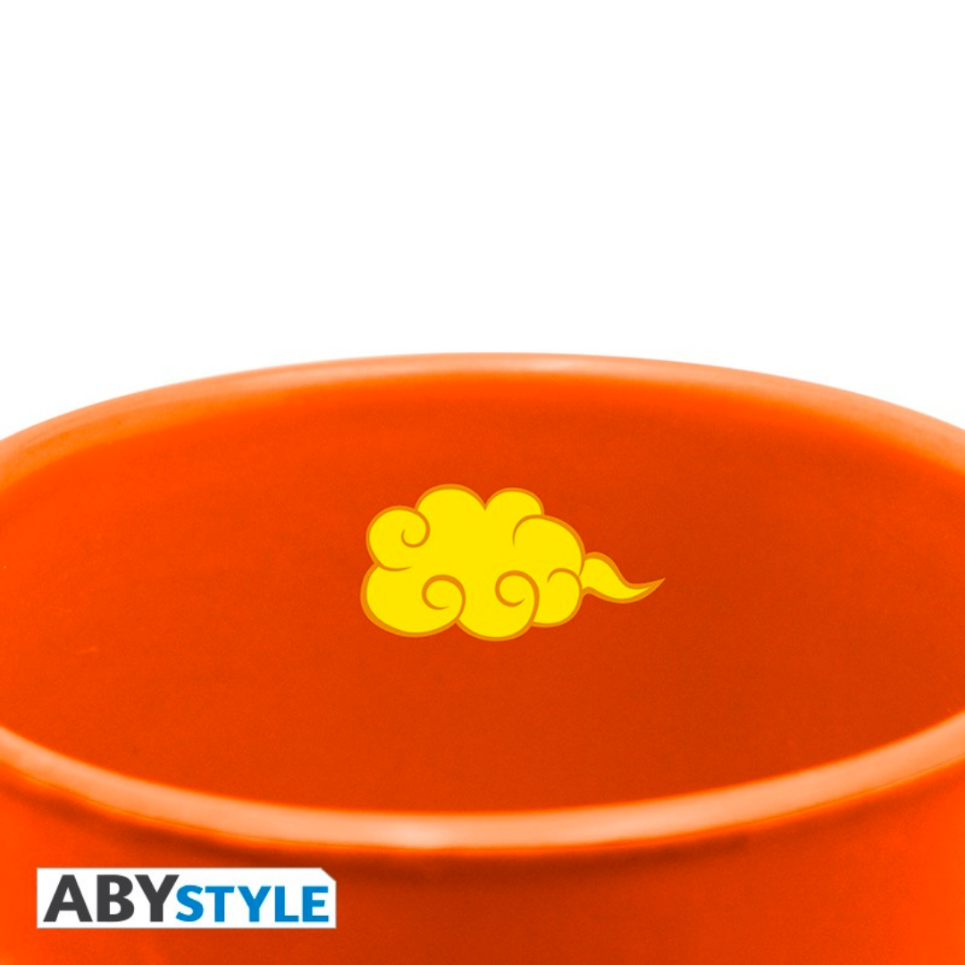 Dragon Ball Z ABYstyle orange mug interior featuring yellow Flying Nimbus cloud design, official anime merchandise for fans and collectors.