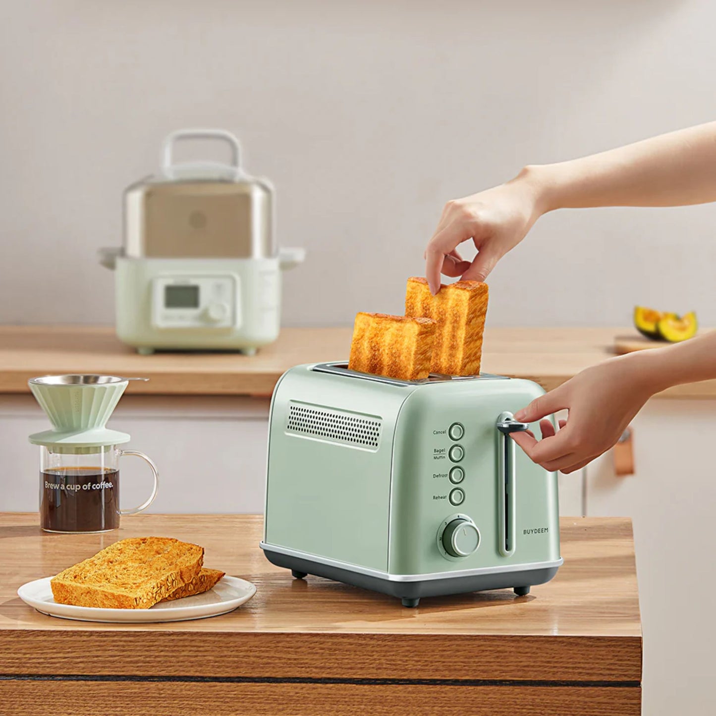 Buydeem 2-Slice Toaster Cozy Greenish in use toasting thick bread slices, perfect for breakfast prep in a modern kitchen