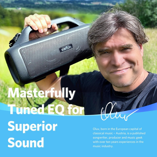 EarFun UBOOM X portable Bluetooth speaker with carry handle, showcased outdoors for masterfully tuned EQ and superior sound quality.