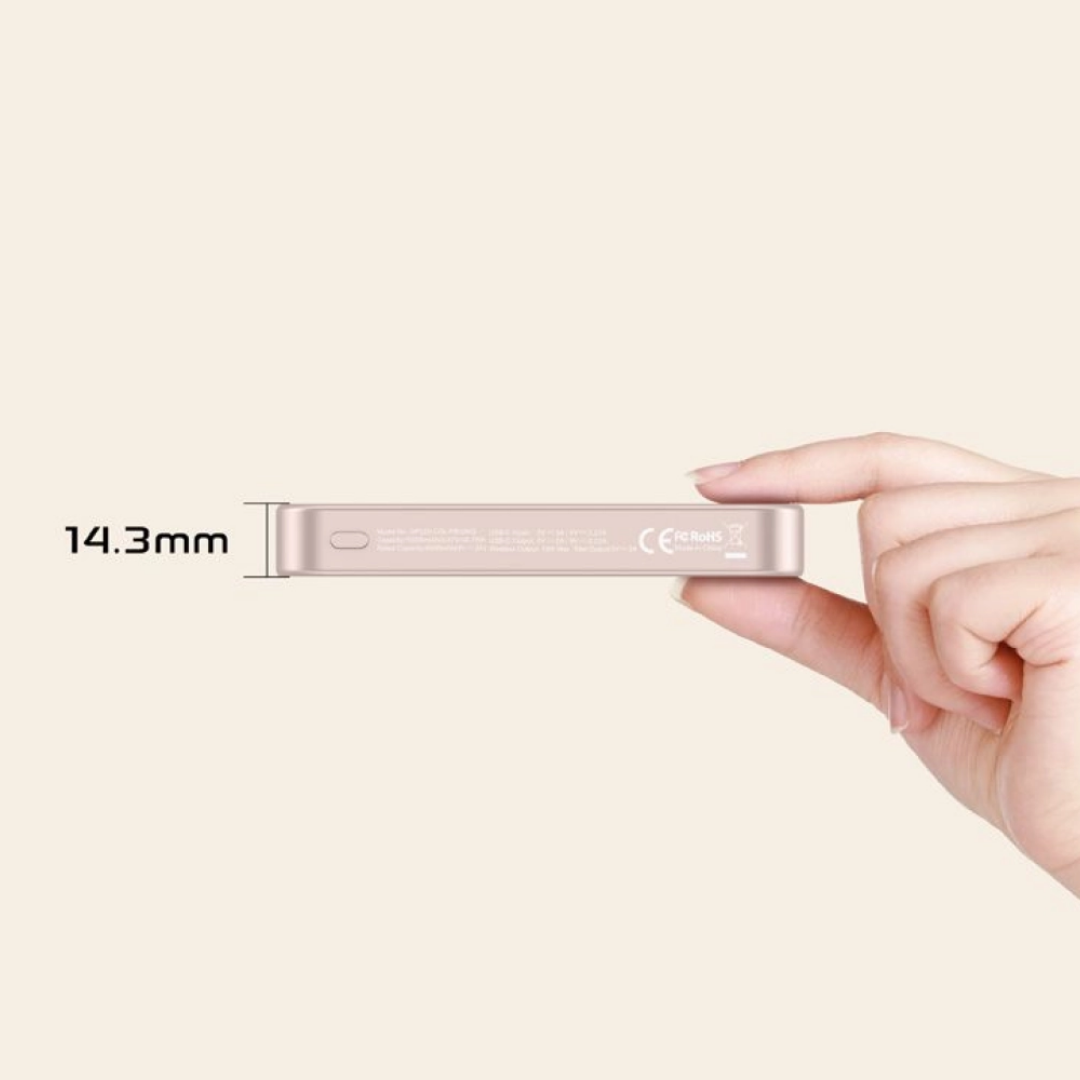 Griffin 10,000mAh MagSafe power bank in pink, highlighting ultra-slim 14.3mm thickness, compact portable charger held between fingers for iPhone.