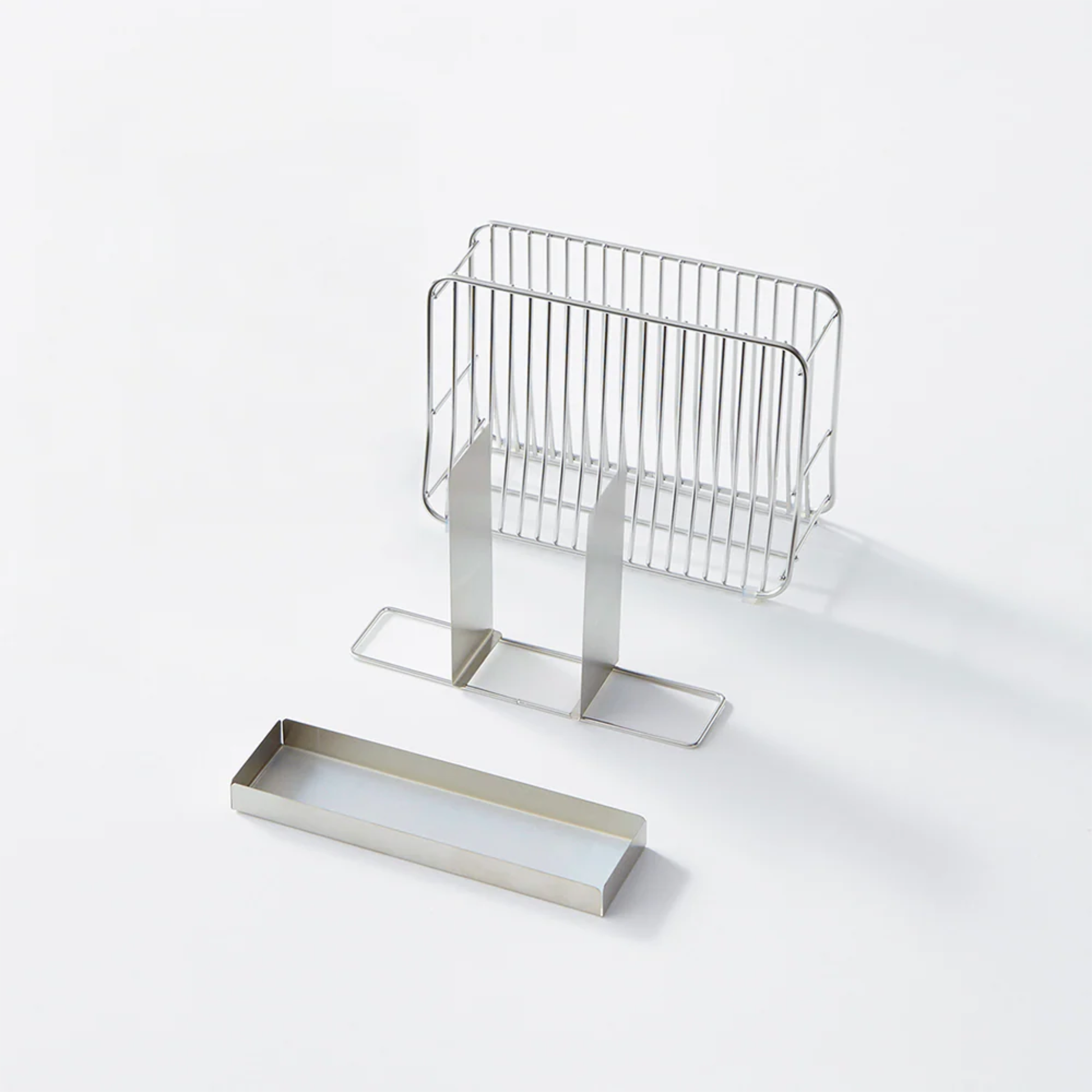 Hanauta stainless steel kitchen rack stand shown disassembled, with removable utensil dividers and drainage tray for easy cleaning and efficient organisation.