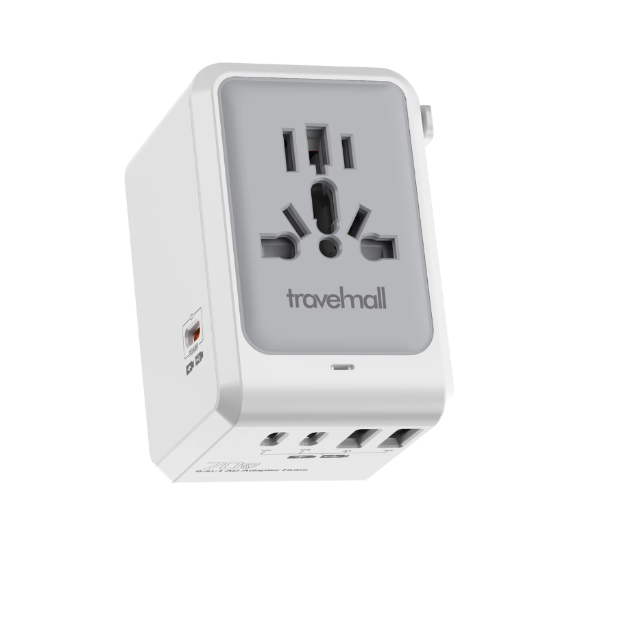 Travelmall universal adapter with all-in-one international socket, retractable UK, US, EU, and AU plug options, and multiple USB ports for charging devices during global travel.