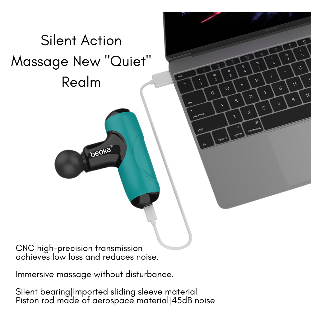 Beoka Q1 Super Mini Percussion Massage Gun in teal charging with USB-C from a laptop, featuring 45dB ultra-quiet operation and CNC high-precision transmission for silent massage.