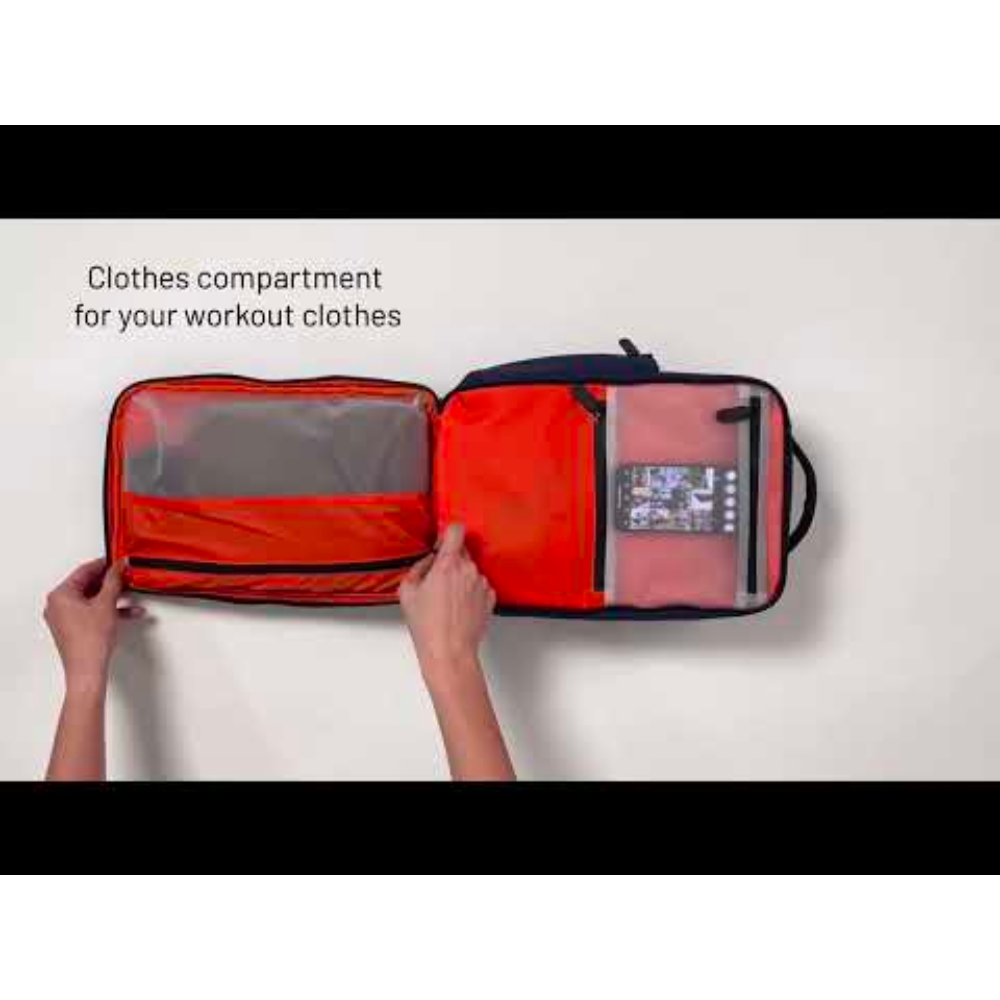 Bold Quiver 13L navy blue sports backpack open to reveal bright orange clothes compartment and tablet sleeve, organized storage for workout clothes and tech accessories