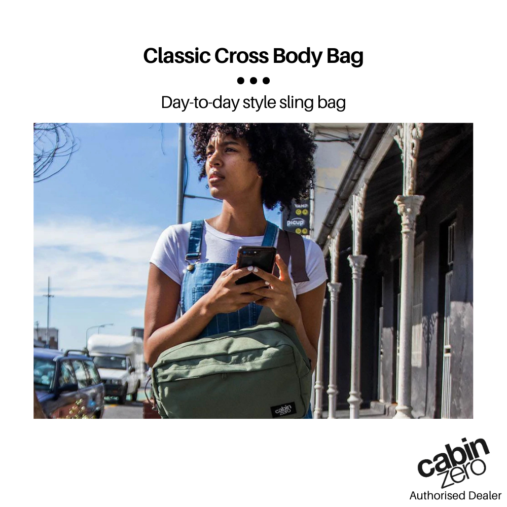 Woman wearing CabinZero Classic Cross Body 11L Companion Bag on the street, ideal for travel and daily use, day-to-day style sling bag