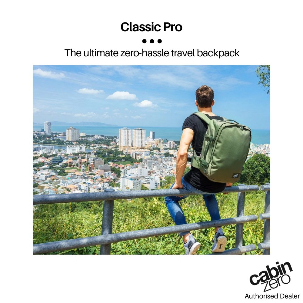 CabinZero Classic Pro 42L Travel Cabin Bag in Georgian Khaki, travel lifestyle photo with backpack outdoors overlooking cityscape