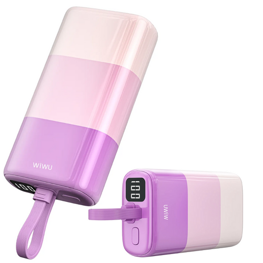 Two WiWU power banks in pastel purple tones—one positioned vertically and the other horizontally—showing the LED display at 100% battery power and the power on/off button, highlighting compact design and full charge status.