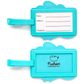 PUCKATOR Pusheen the Cat Summer Surfer PVC Luggage Tag in pink and turquoise, featuring Pusheen on a surfboard with palm tree background.
