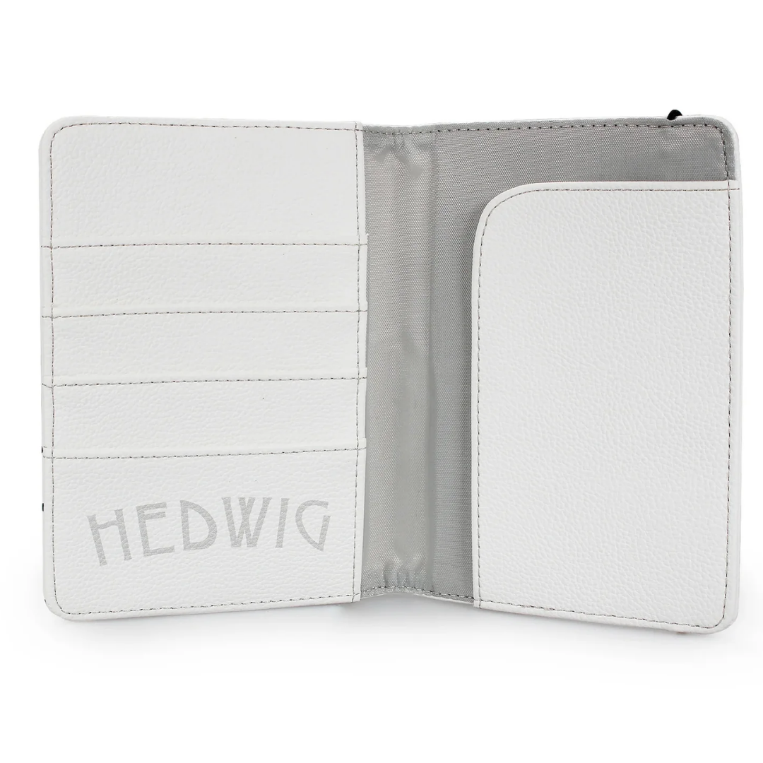Official Harry Potter Hedwig PU Leather Passport Holder and Travel Wallet featuring Hedwig’s yellow eyes, 4 card slots, and inner HEDWIG print.