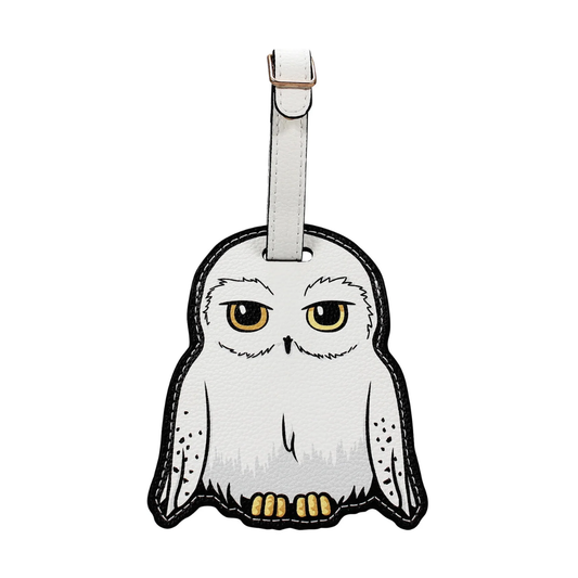 Official Harry Potter Hedwig PU Leather Luggage Tag with yellow eyes, clear contact window, and buckle strap – ideal travel accessory for fans.