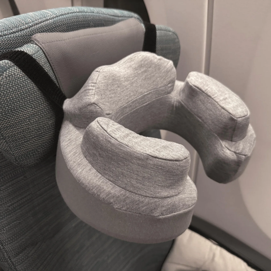 Travelmall Eco-Friendly Comfort-Bounce Memory Foam Neck Pillow with 3D ergonomic design, seat strap, front velcro, and recycled bottle fabric cover.