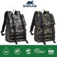 Rivacase 7621 backpack securely attached to a rolling suitcase using built-in trolley strap