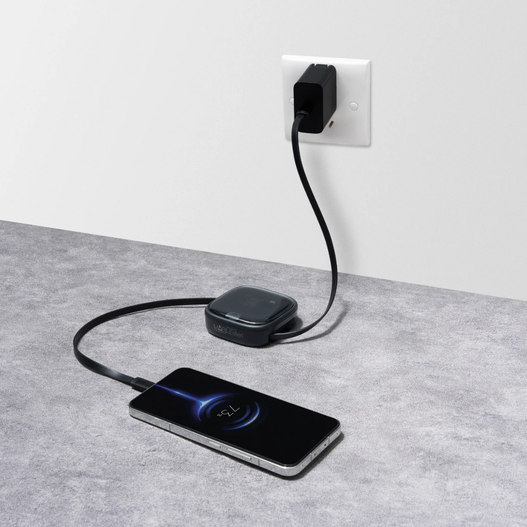 Travelmall Switzerland 8-in-1 Multi-Tool Travel Essential – compact USB-C kit with SIM storage, adapters, retractable cable, and ejector pin.