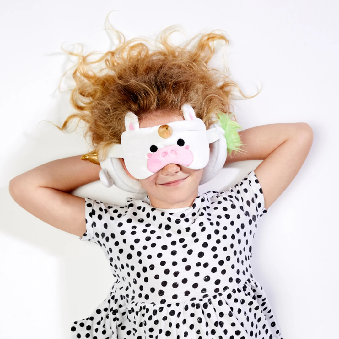 Child Using Unicorn Neck Pillow – Perfect for Travel and Nap Time