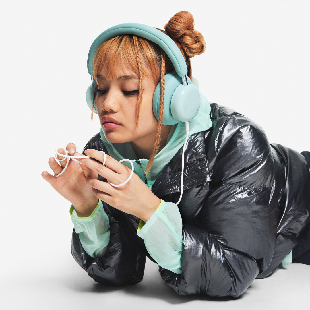 “Close-up of CMF Headphone Pro roller control and energy slider”

