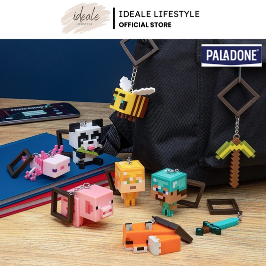 Assorted Minecraft character bag clips attached to a backpack.