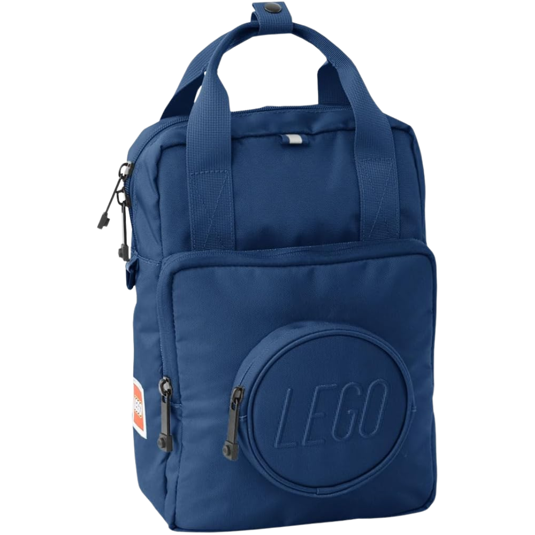 Main Image: LEGO Signature Brick 1x1 Kids Backpack in a vibrant color, featuring the iconic brick-shaped front pocket and side water bottle holder.