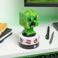 Minecraft Creeper motion-activated light pulsing red to detect movement.