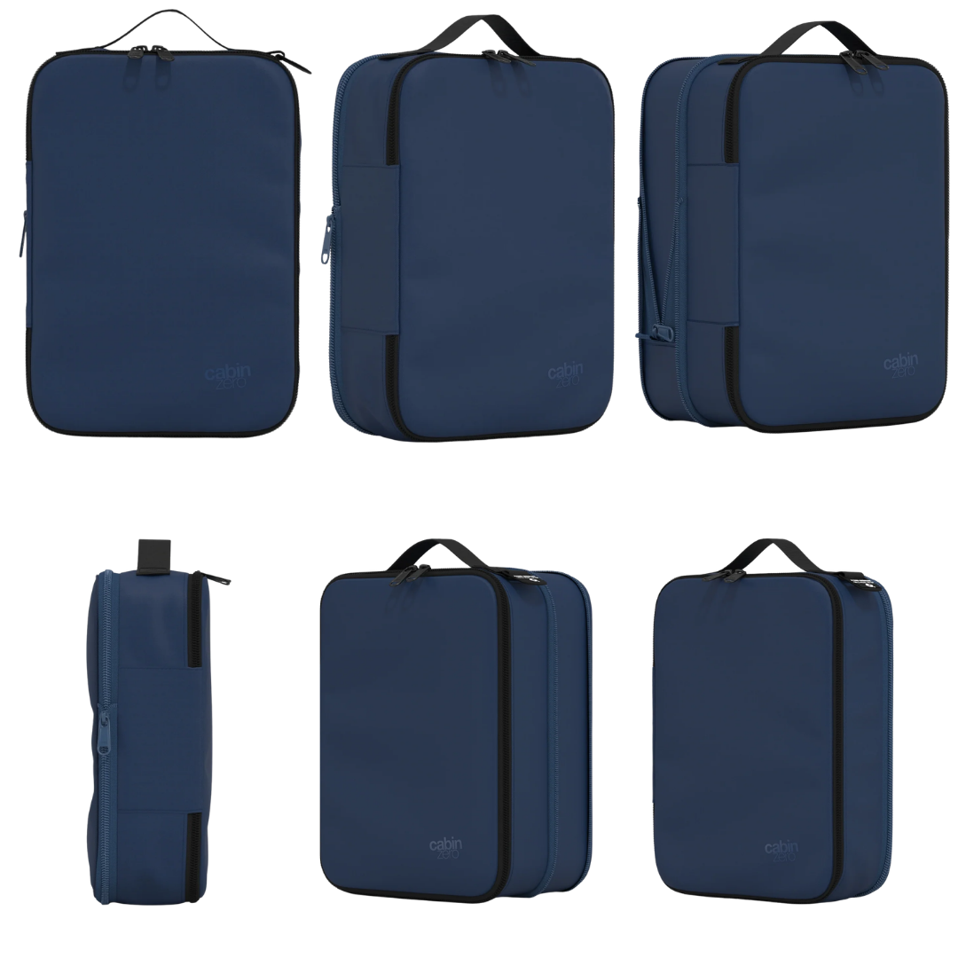 Okoban tracking tag detail on a CabinZero Lux compression travel organizer.