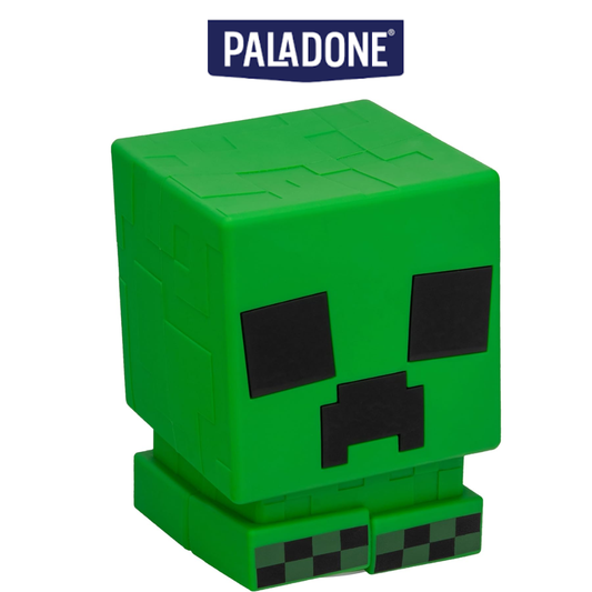 Paladone Minecraft Creeper SquishyGlo glowing green on a dark bedside table