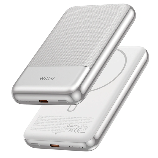The power bank snapped securely onto the back of a compatible smartphone, demonstrating 15W magnetic wireless charging.