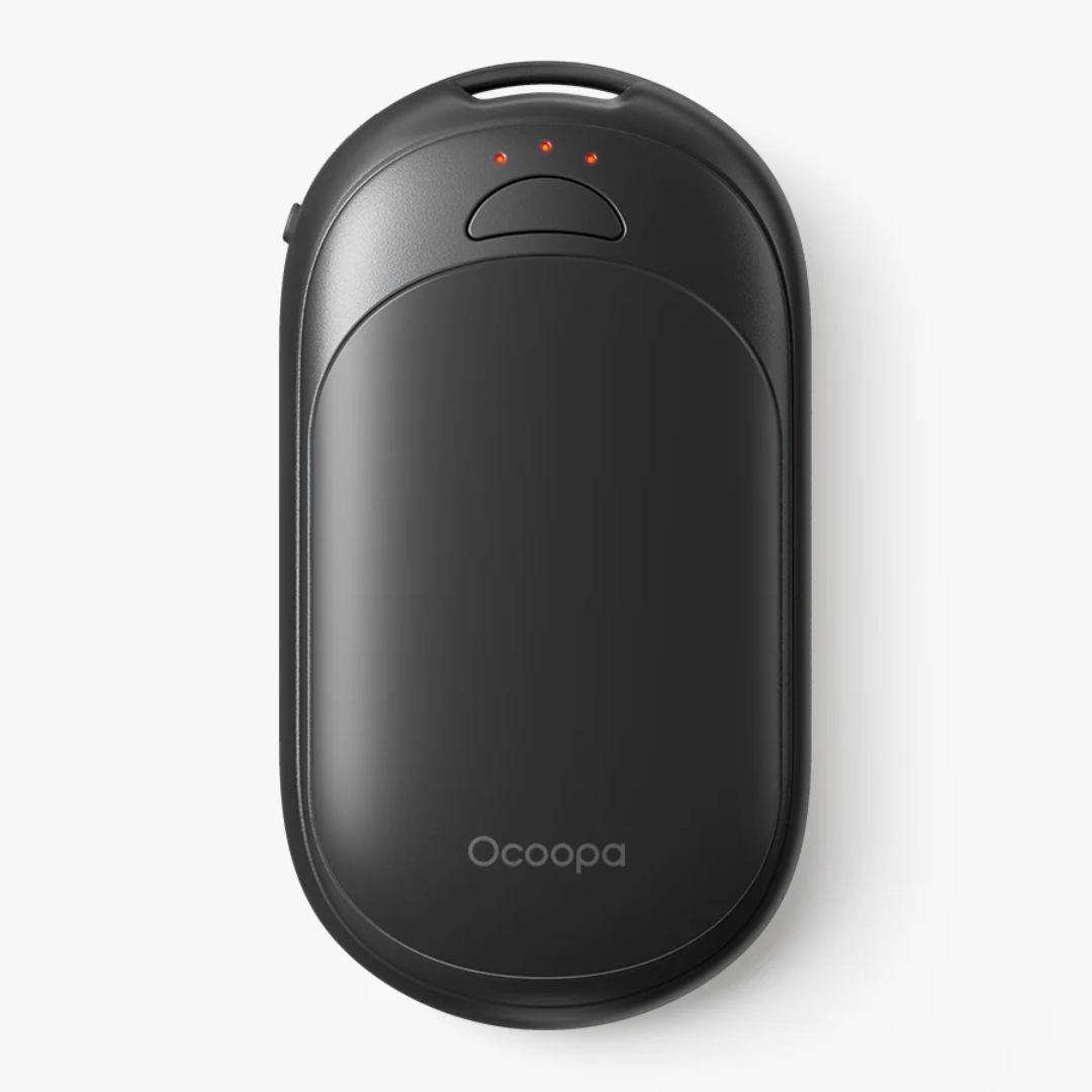 Ultra-slim 1.8cm Ocoopa hand warmer slipping into a winter glove-Black