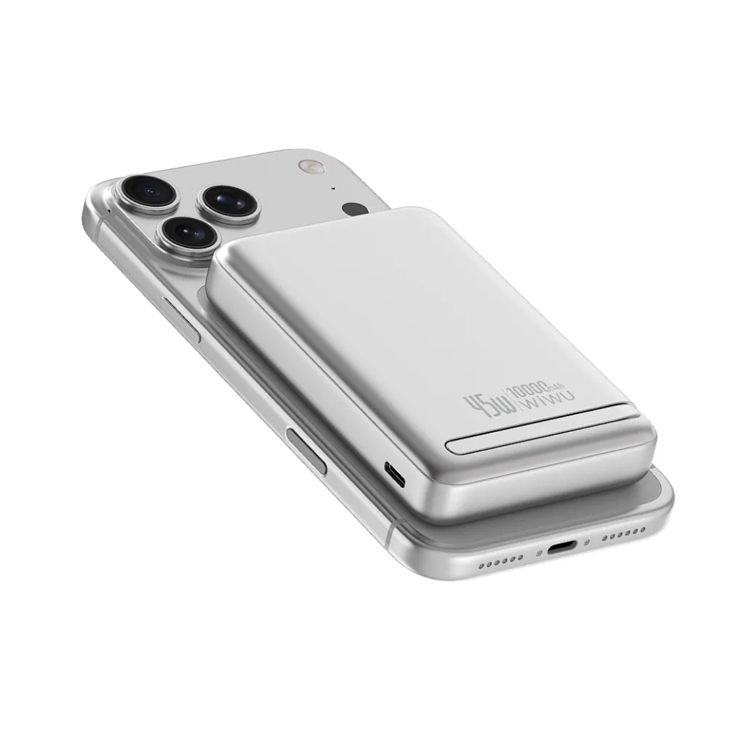 WiWU Mag Pro Qi2 power bank snapping magnetically to the back of a flagship smartphone-2