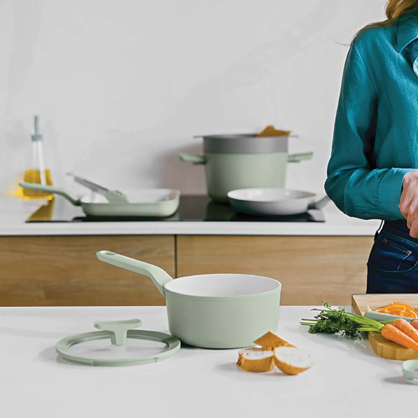 BERGHOFF Balance 18cm Saucepan with eco-friendly ceramic non-stick coating in a modern kitchen scene, shown with ingredients and matching cookware on an induction cooktop