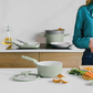 BERGHOFF Balance 18cm Saucepan with eco-friendly ceramic non-stick coating in a modern kitchen scene, shown with ingredients and matching cookware on an induction cooktop