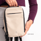 Bold Mimic Sling Bag in earth beige, held by model in hand; minimalist, versatile crossbody bag for travel and daily use.