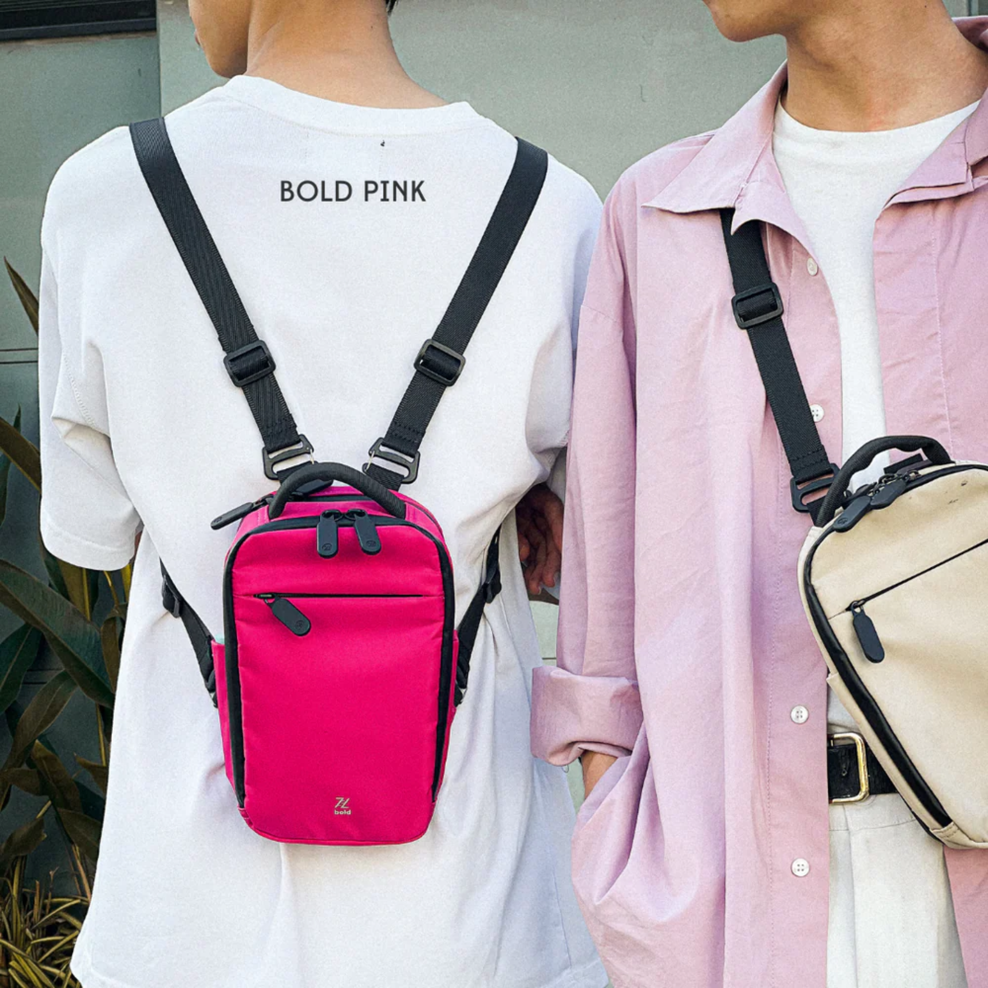 Bold Mimic Sling Bag in pink and earth beige, worn crossbody by two models; urban street style, versatile everyday carry bags