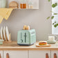 Buydeem 2-Slice Toaster Cozy Greenish toasting English muffins on kitchen counter with milk and breakfast sandwich
