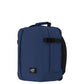 Back view of CabinZero Classic Tech Bag 28L in Navy Blue featuring padded adjustable shoulder straps, top handle, and side handle for ergonomic comfort and easy carrying.