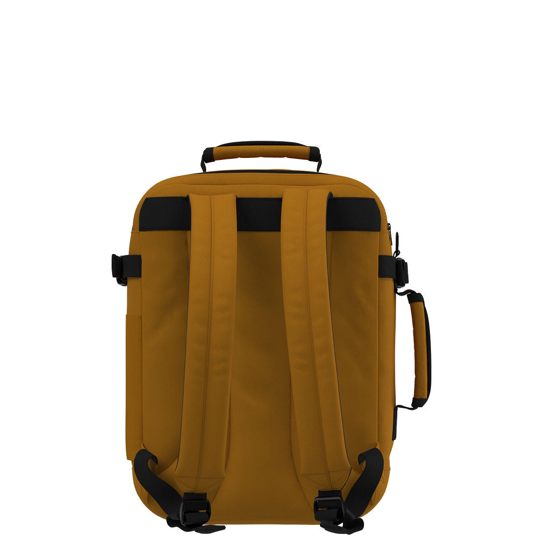 Back view of CabinZero Classic Tech Bag 28L in Orange Chill with padded adjustable shoulder straps, top handle, and side handle—designed for ergonomic comfort on travel and daily commutes.