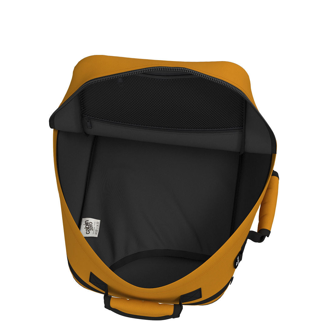 CabinZero Classic Tech Bag 28L in Orange Chill with open main compartment and mesh pocket, designed for efficient organization and spacious packing of travel or tech essentials.