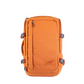 CabinZero ADV 32L Sahara Sands travel backpack front view, made with water-resistant 500D ripstop nylon, featuring quick-access front zip pocket, side compression straps, airflow padded back, expandable water bottle pocket, RFID blocking pocket, and padded laptop sleeve, shown in vibrant orange shade