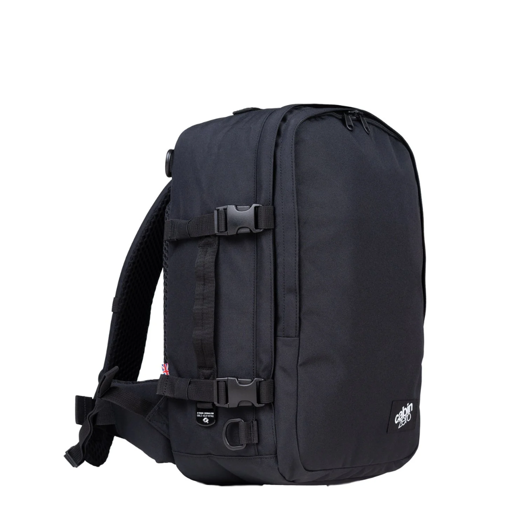 CabinZero Classic Pro 32L Absolute Black backpack angled side view showing compression straps and padded hip belt