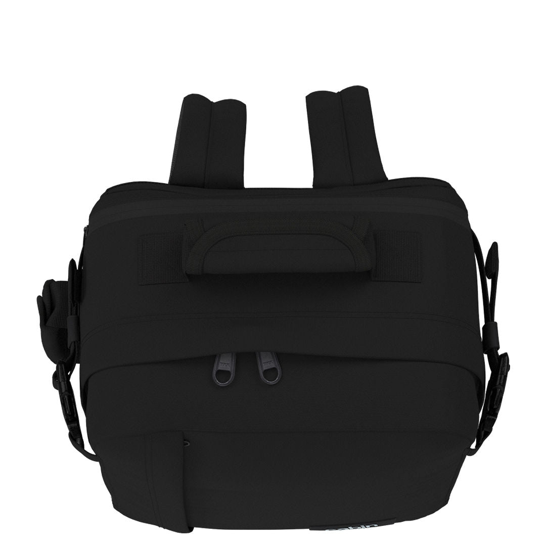 Top view of CabinZero Classic Tech Bag 28L in Absolute Black highlighting padded carry handle, adjustable shoulder straps, and dual zipper openings for easy access and comfortable travel.