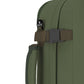 Close-up of CabinZero Classic Tech Bag 28L in Georgian Khaki showing the compression strap, Tracer tag, and padded side handle for secure and comfortable carrying during travel.