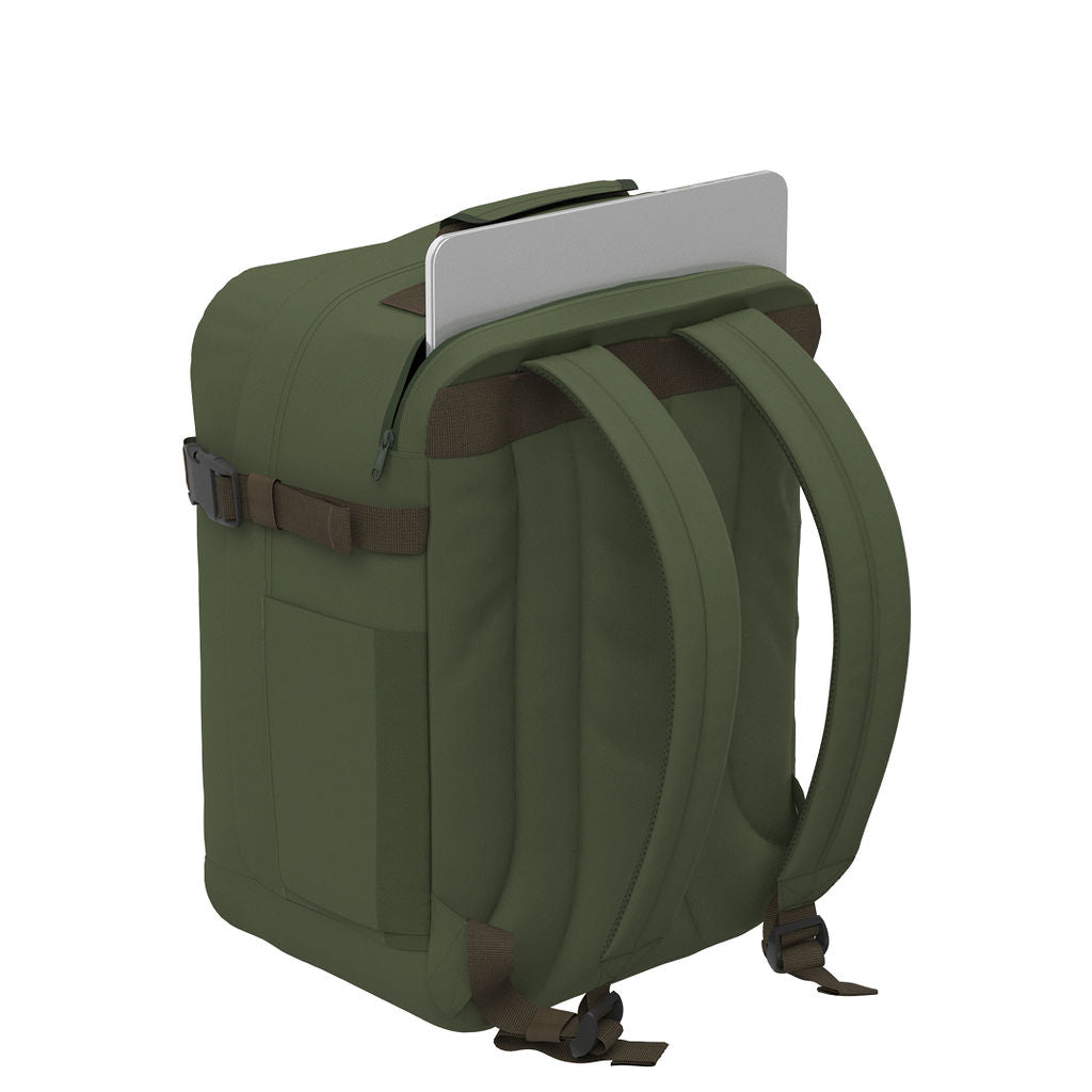 CabinZero Classic Tech Bag 28L in Georgian Khaki showing dedicated rear laptop compartment and padded shoulder straps for secure tech storage and comfortable travel use.