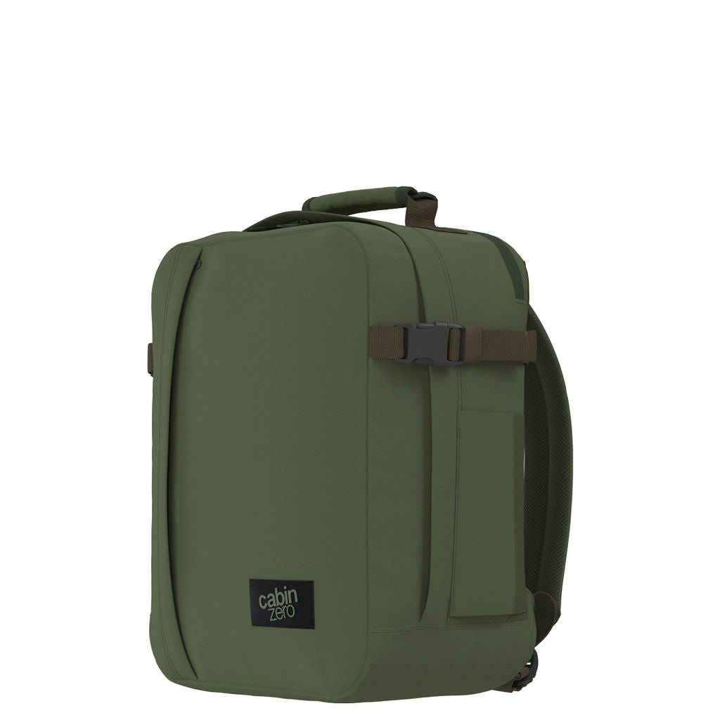 Side angle view of CabinZero Classic Tech Bag 28L in Georgian Khaki showing compression straps, padded back panel, and clean lines—ideal for travel, work, and everyday commuting.