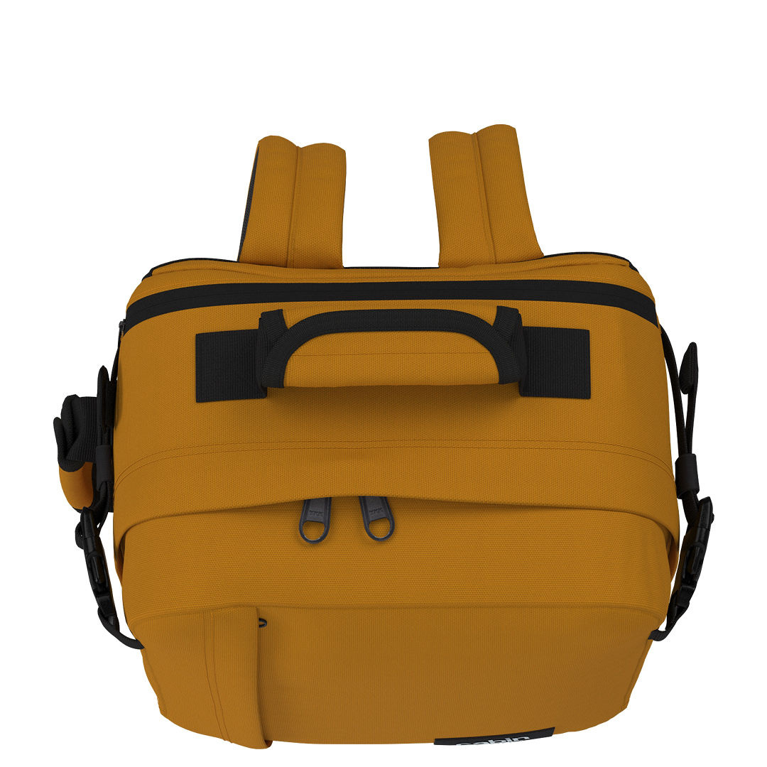 Top view of CabinZero Classic Tech Bag 28L in Orange Chill showing padded carry handle, adjustable shoulder straps, and dual zipper openings for versatile travel and everyday use.