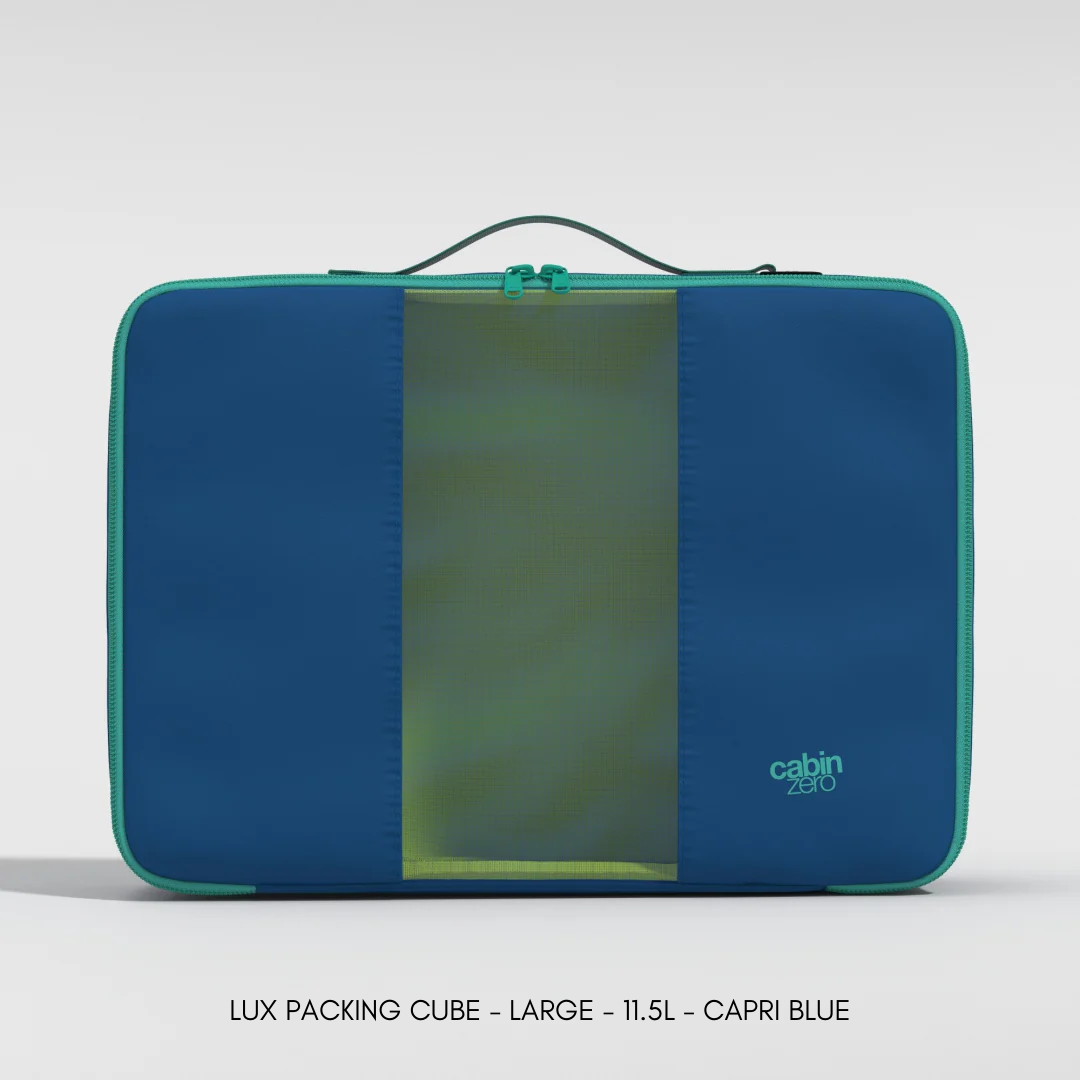 Front view of a large CabinZero Lux Packing Cube in Capri Blue with a central mesh panel, double zipper closure, top handle, and the CabinZero logo in the lower right corner.