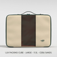 Front view of a large CabinZero Lux Packing Cube in Cebu Sands color, featuring a beige body, dark green trim, a central black mesh panel, double zipper closure, top handle, and the CabinZero logo in the lower right corner