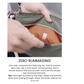 Close-up of hands opening an olive green CabinZero Sacoche pouch, revealing an orange interior with an RFID block label and multiple compartments.