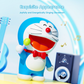 Doraemon Mic King Bluetooth Speaker with a red bow tie and green microphone, joyfully singing on a colorful stage with musical notes, blue guitar, and speaker in the background