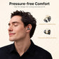 Man wearing EarFun Clip LDAC Open-Ear Bluetooth Earbuds, showing adjustable C-shaped strap and stability structure for pressure-free comfort